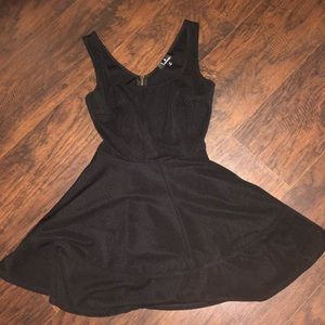 Black fitted top flowy bottom dress